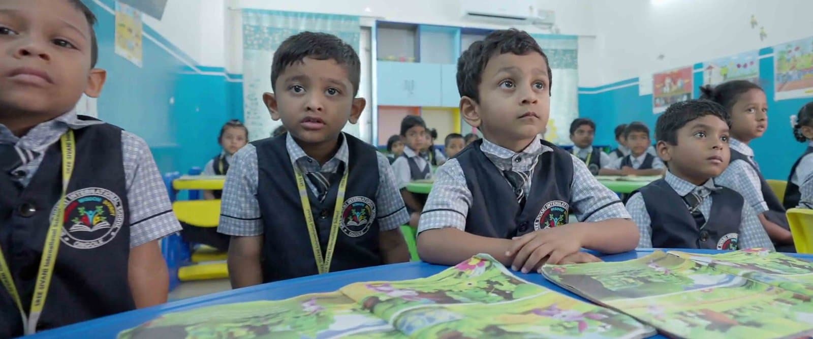 Pre-Primary students drawing and creating