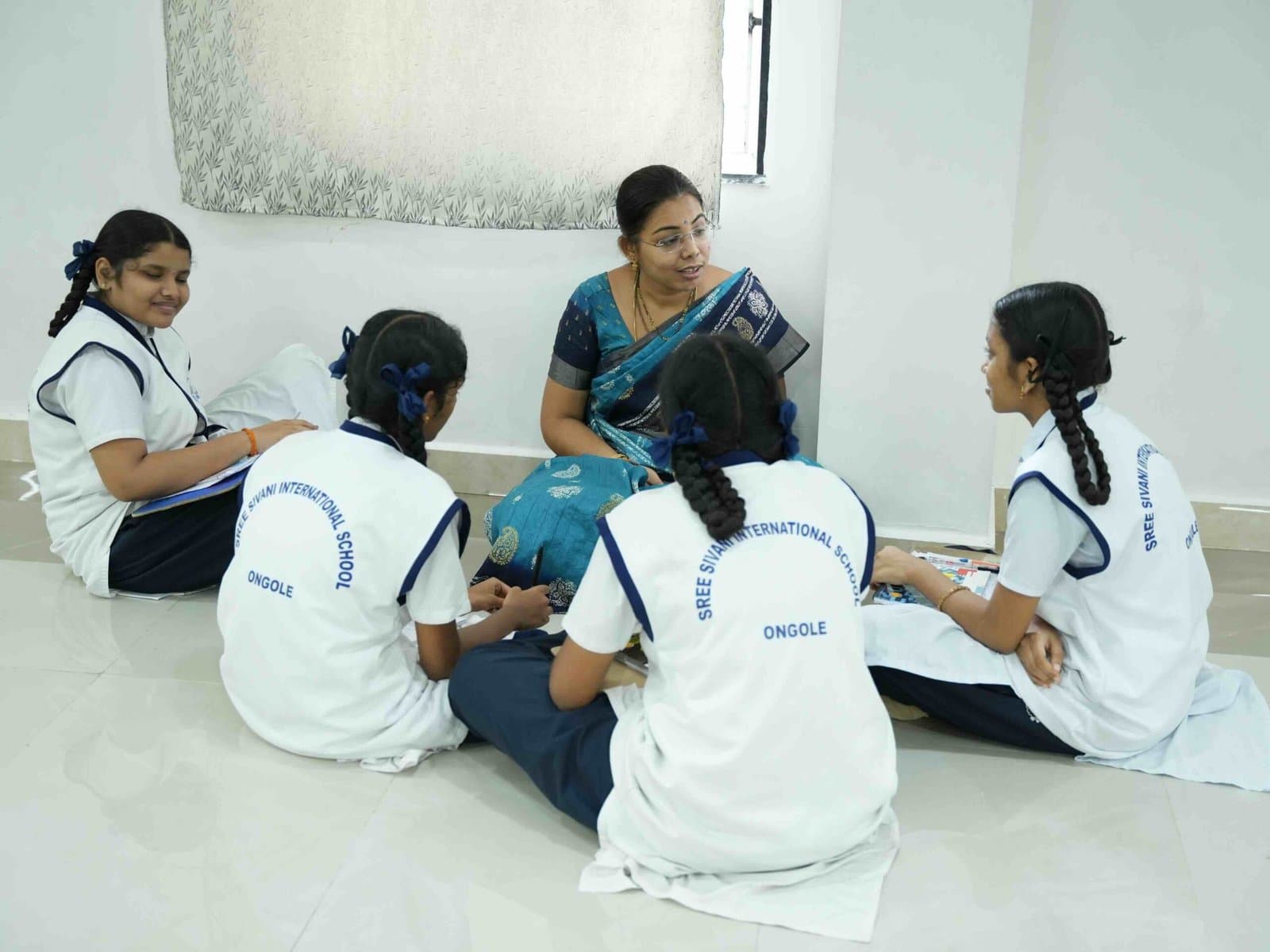 Sree Sivani teachers with students